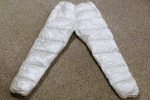 A pair of Goosefeet Gear custom ultralight Cuben Fiber down pants